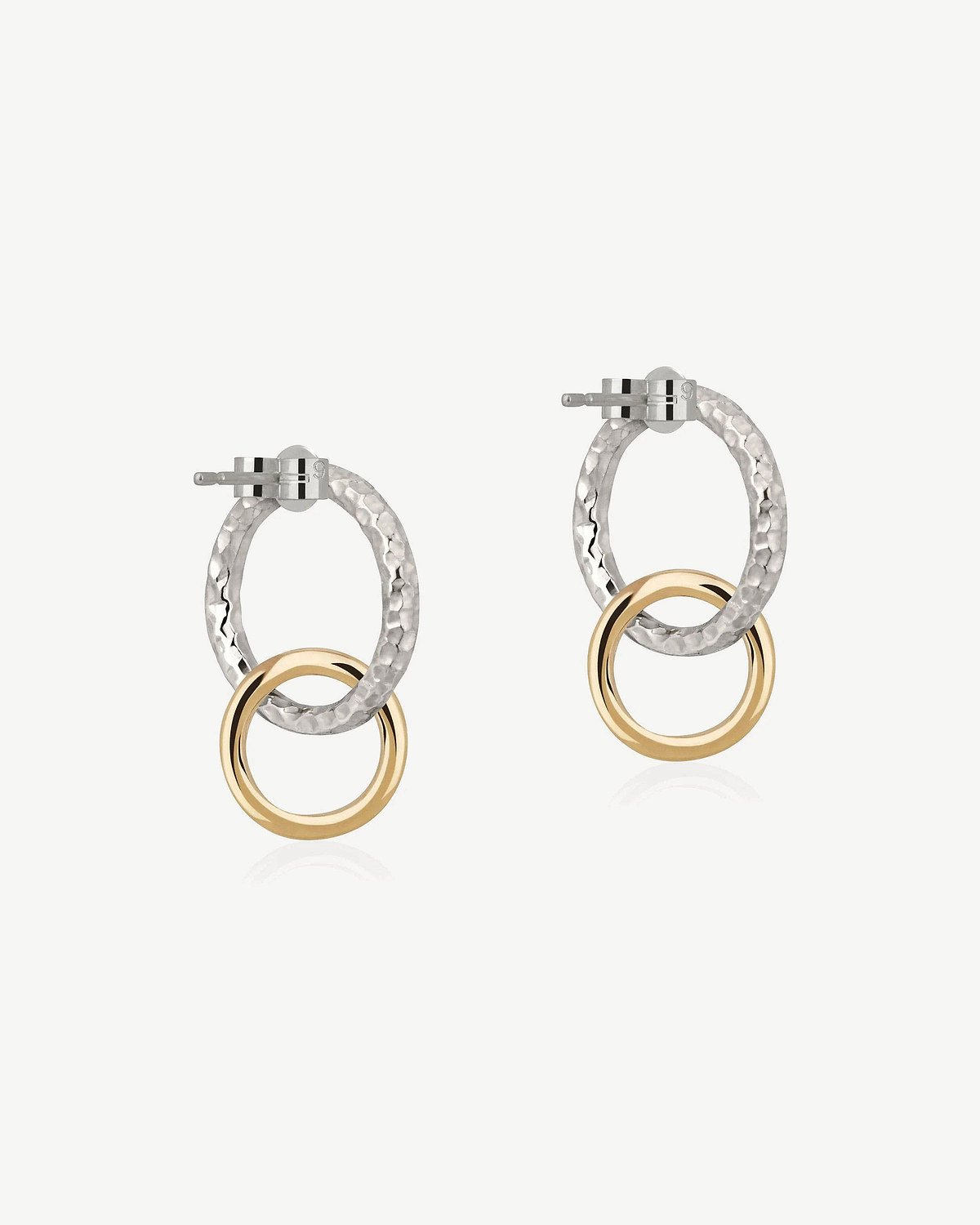 Pair of halo earrings with hammered sterling silver ovals and 24-carat gold rings