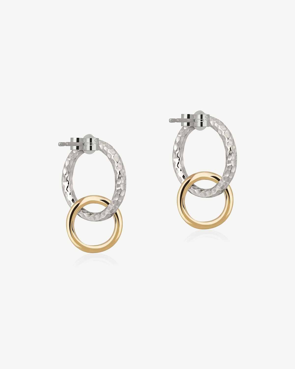 Pair of halo earrings with hammered sterling silver ovals and 24-carat gold rings