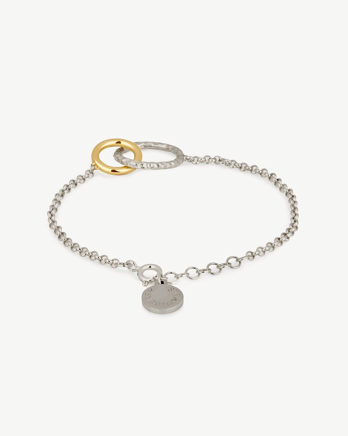Sterling silver chain bracelet with interlocking 24 carat gold and hammered silver rings.