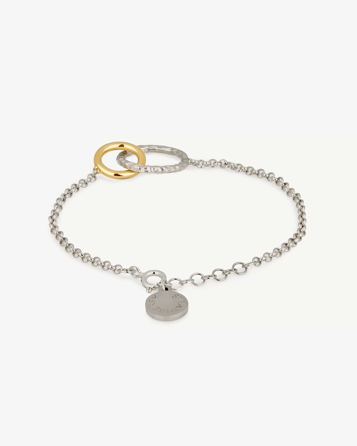 Sterling silver chain bracelet with interlocking 24 carat gold and hammered silver rings.