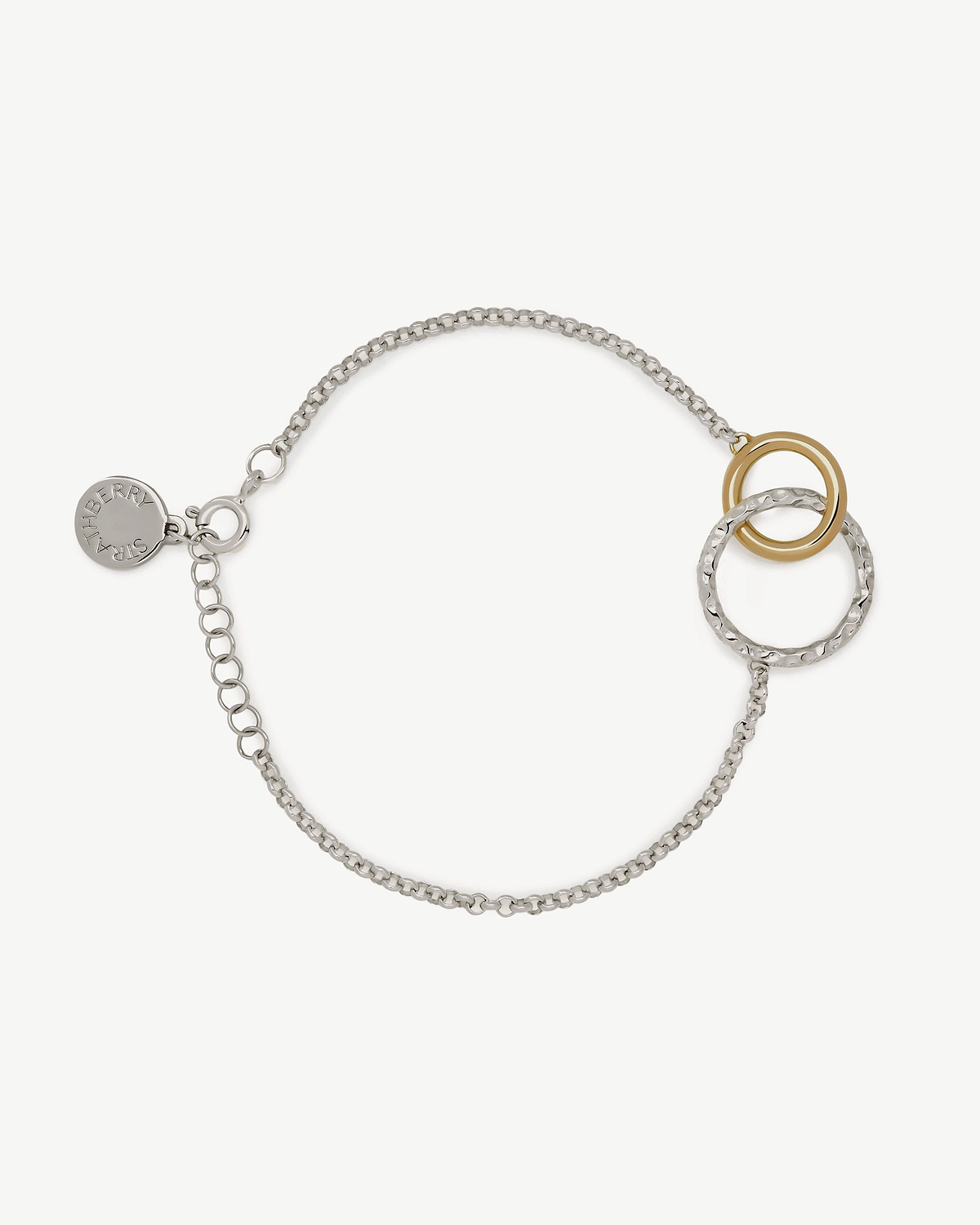 Strathberry sterling silver bracelet with two interlocking rings and 24ct gold accent.