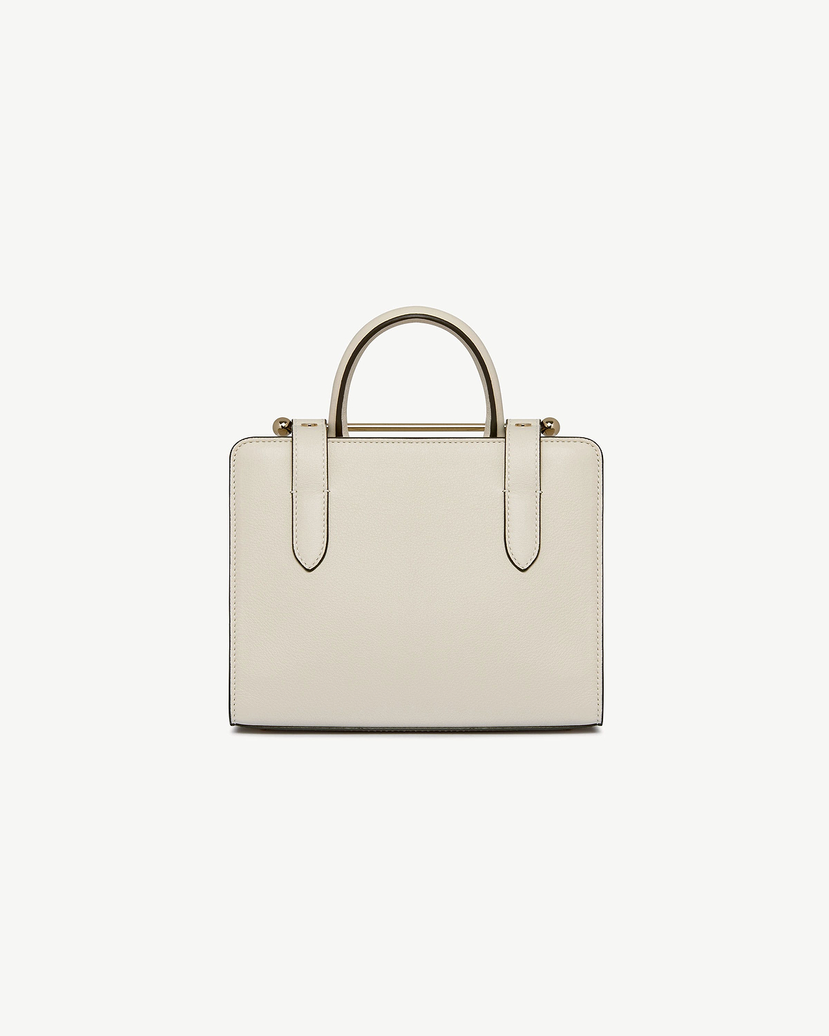Vanilla leather mini tote bag front view with top handles and strap details.