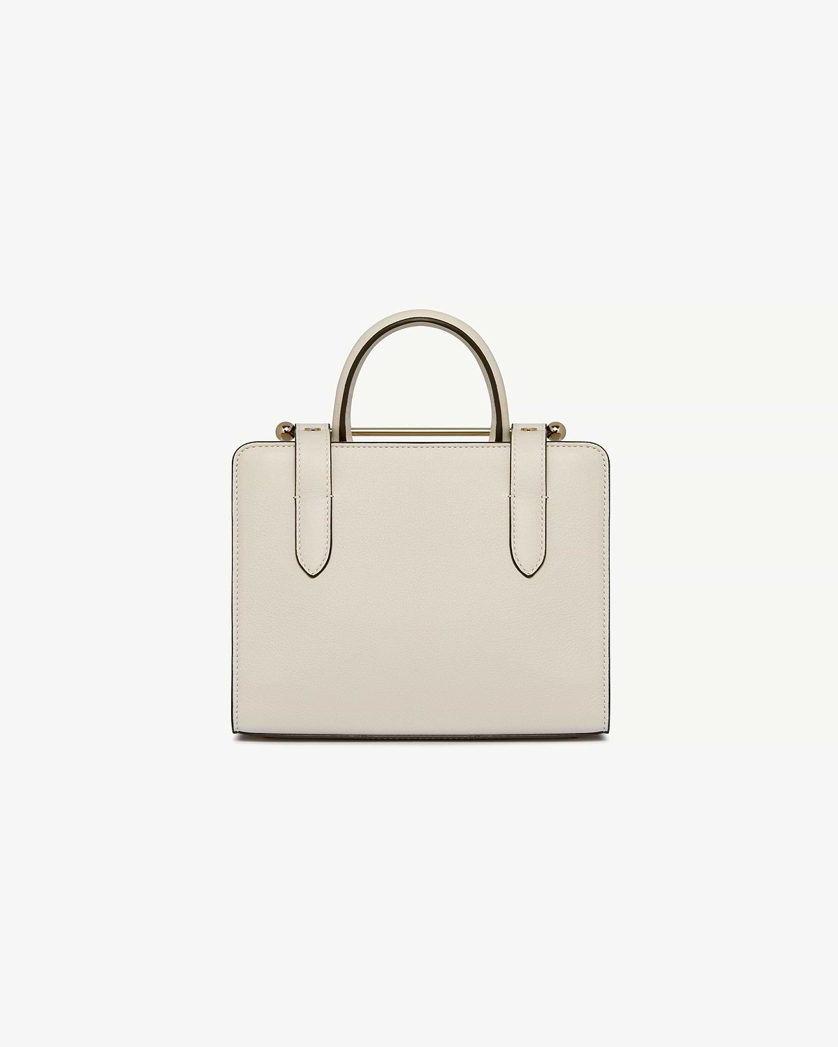 Vanilla leather mini tote bag front view with top handles and strap details.