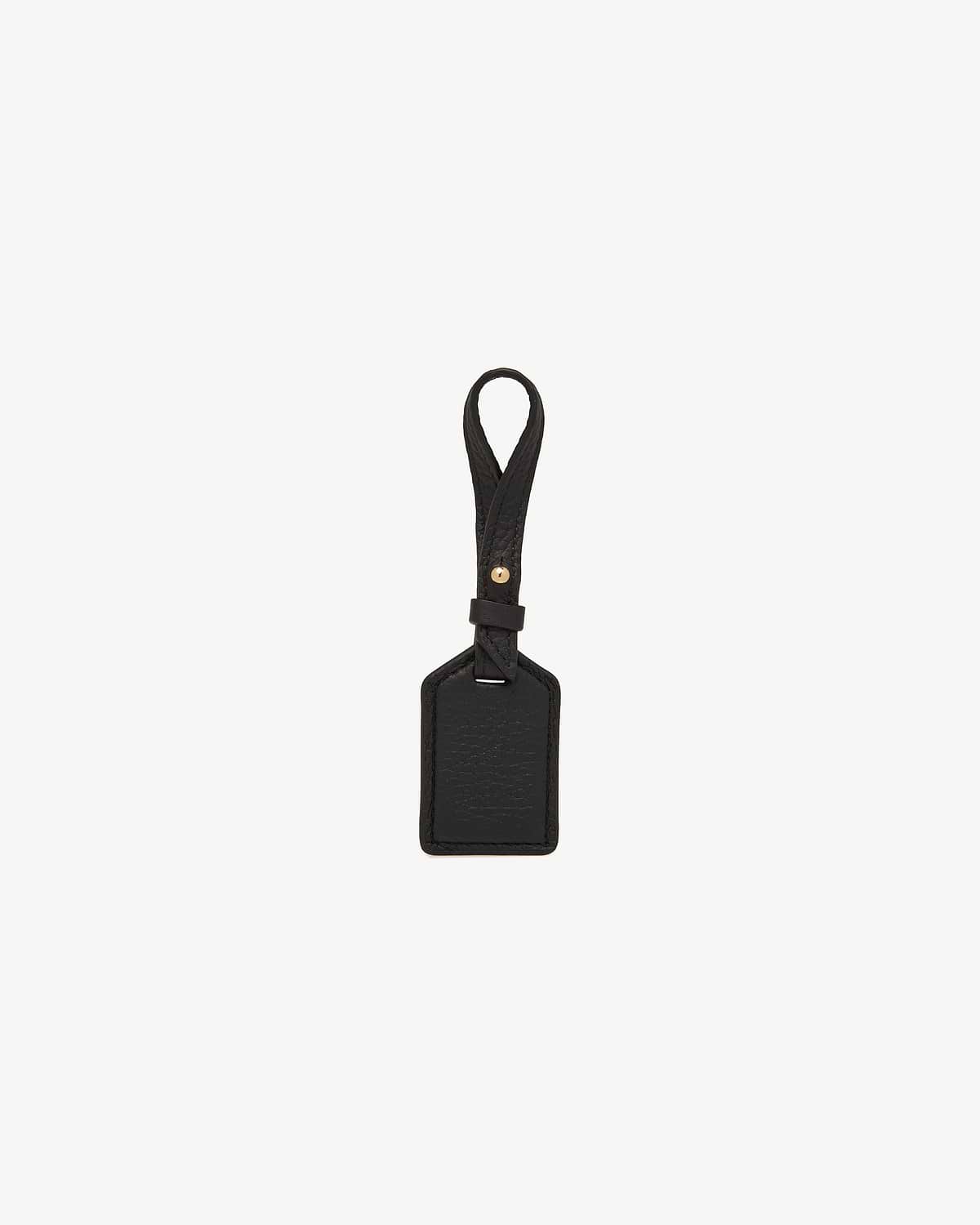 Black leather tag with loop strap, stitched edges and a small gold stud.
