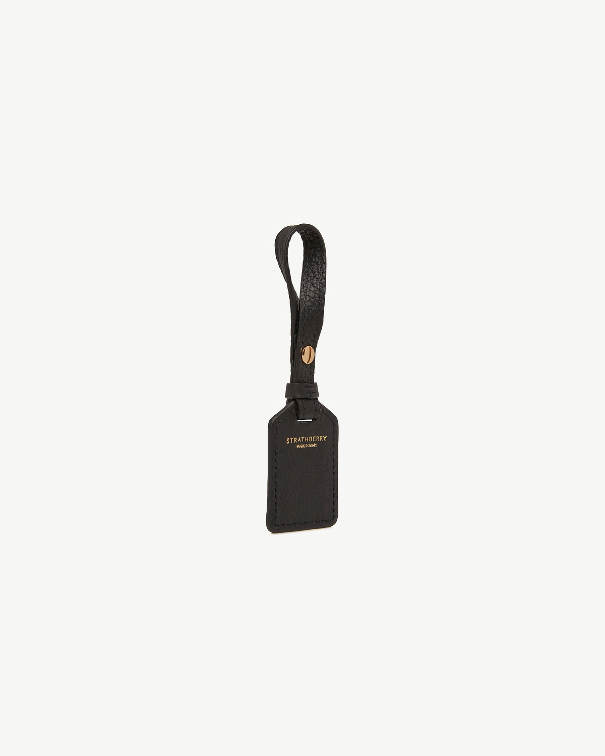 Black leather tag with Strathberry gold logo and looped strap.