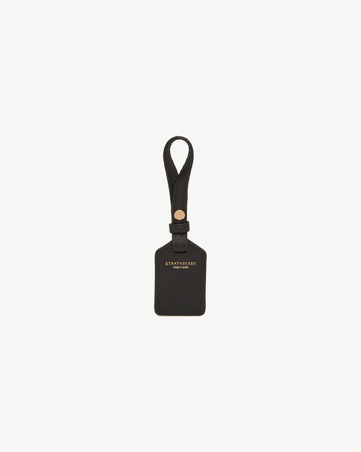 Black leather tag with loop strap and gold Strathberry logo.