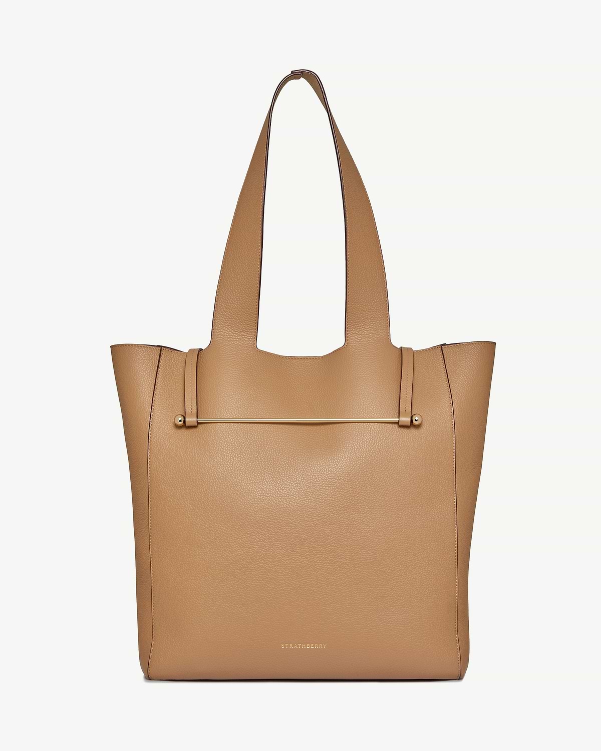 Strathberry Melody tote in caramel pebbled leather with external gold bar detail.