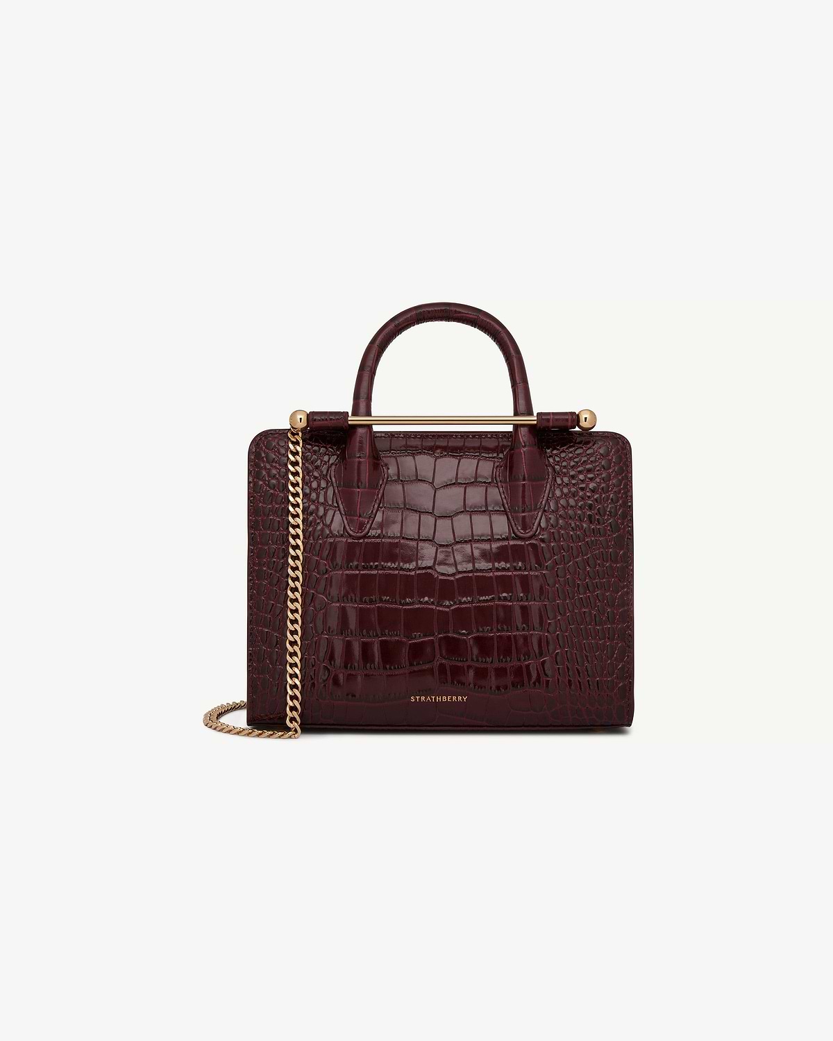 Strathberry burgundy croc mini tote with top handles, gold bar and chain strap