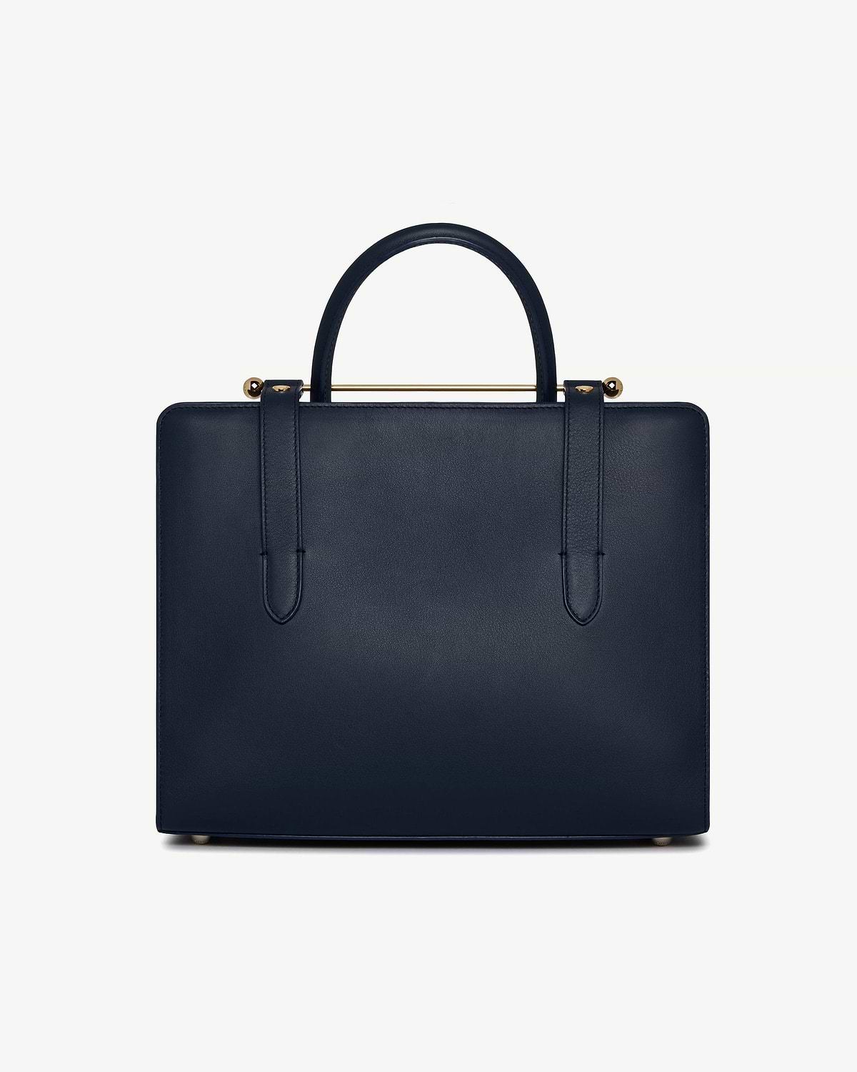 Marine blue midi tote, structured rectangular shape, single top handle, gold bar, metal feet.