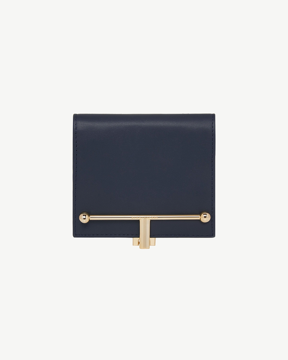 Melville Street wallet in marine blue leather with gold horizontal bar clasp.