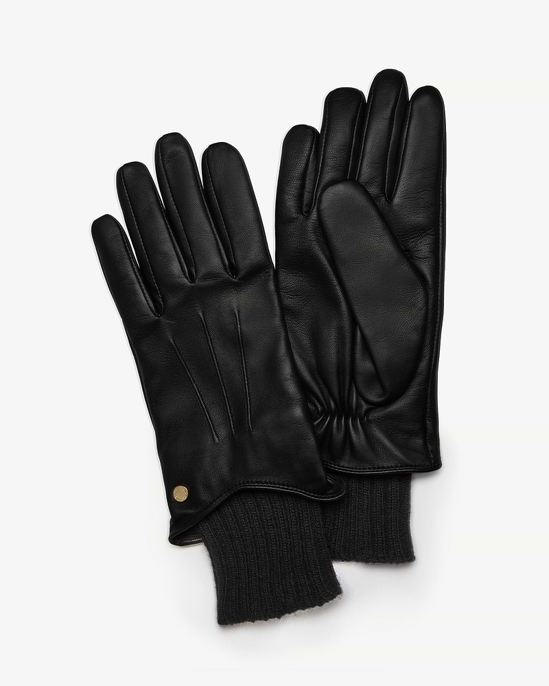 Pair of black leather gloves with ribbed knit cuffs and gold stud detail
