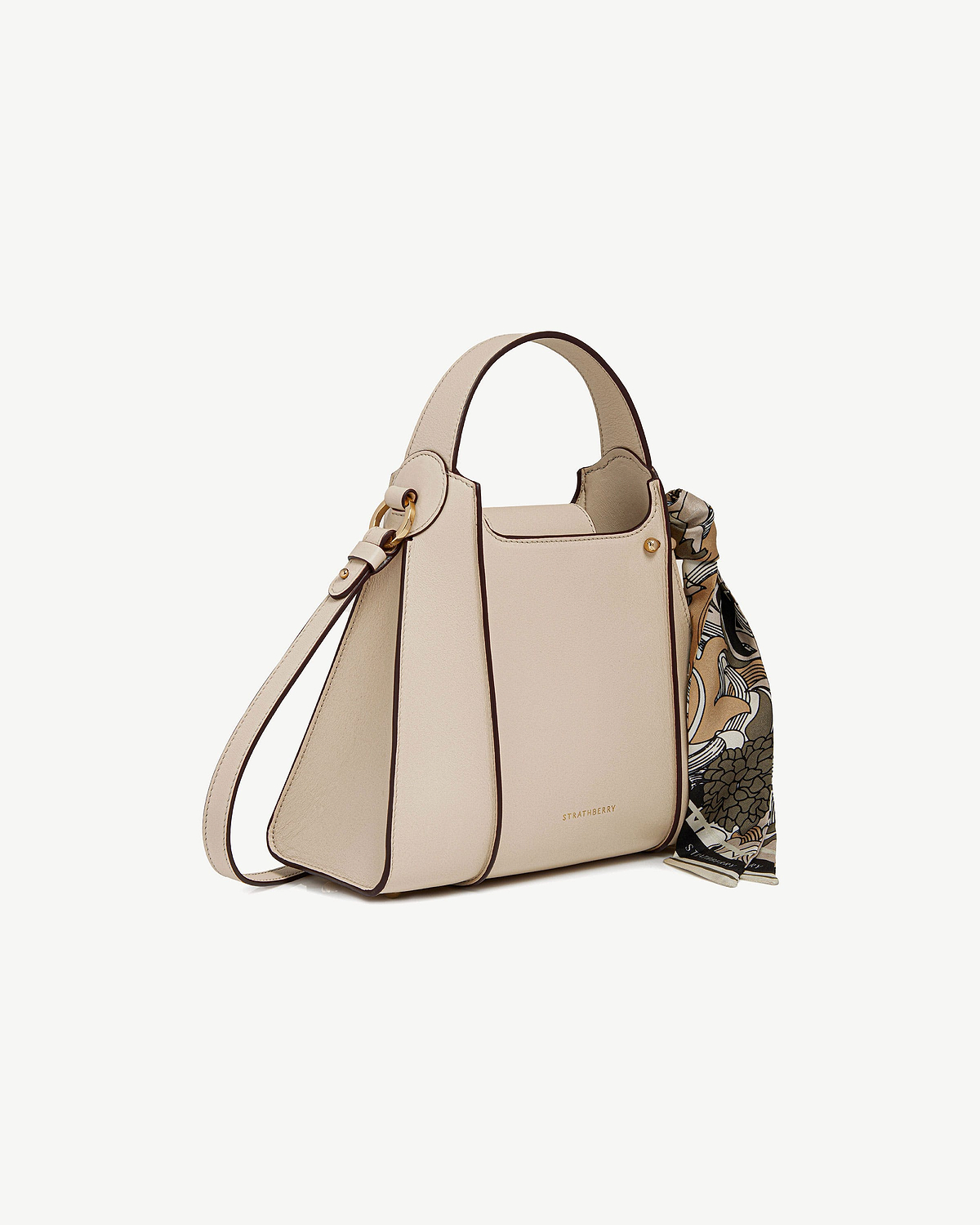 Strathberry Arkshell tote bag in oat leather with printed silk scarf.