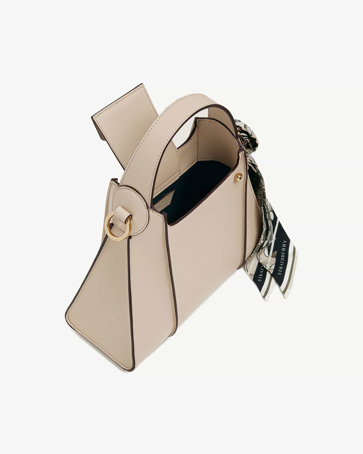 Oat Arkshell leather bag with top handle and a patterned tied scarf.