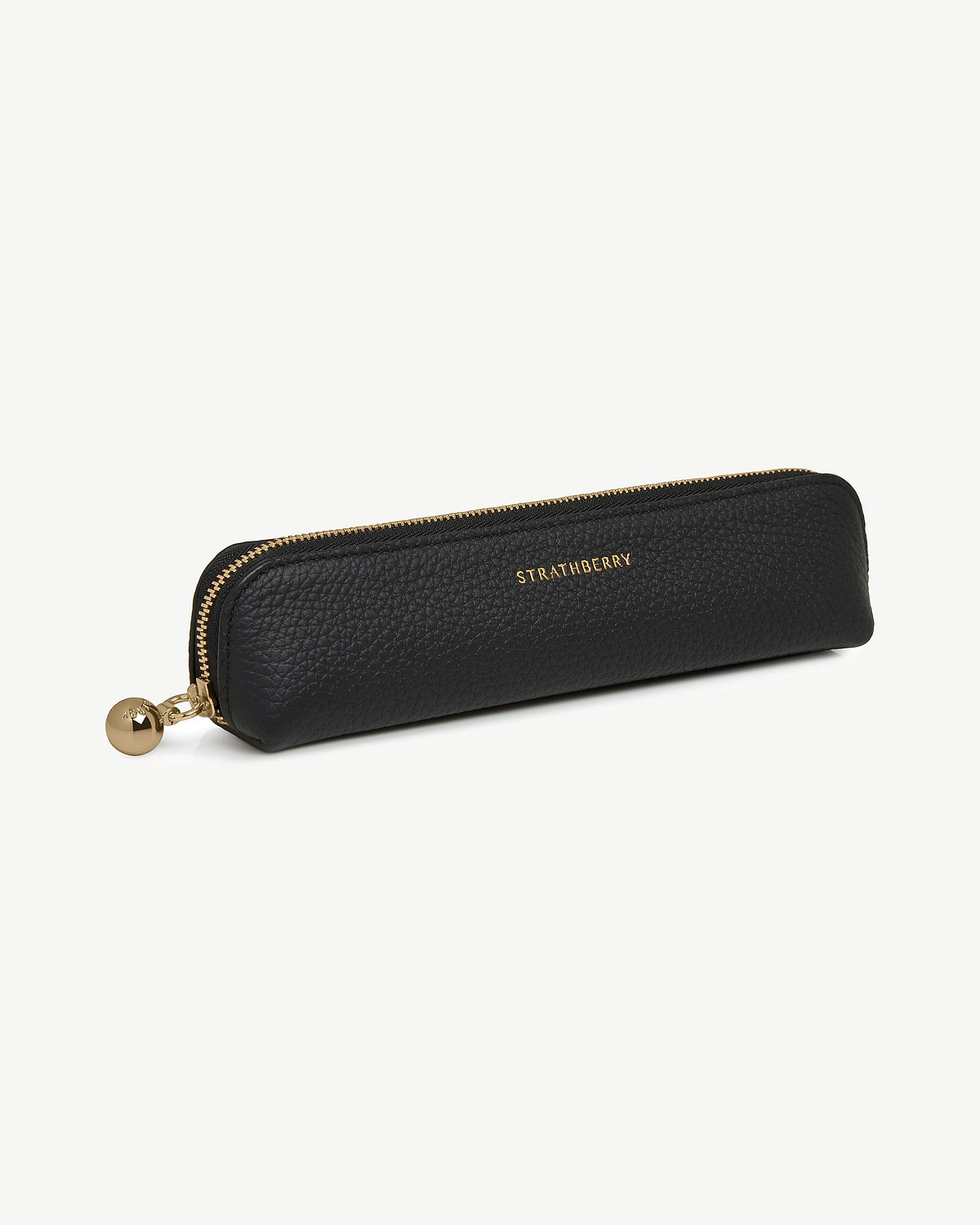 Black pebbled leather pencil case with gold zip and Strathberry logo.