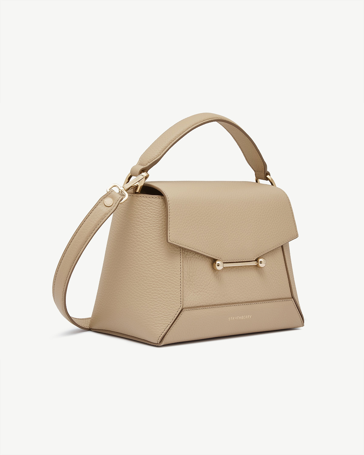 Strathberry sand leather mosaic bag with top handle, shoulder strap and gold bar clasp.
