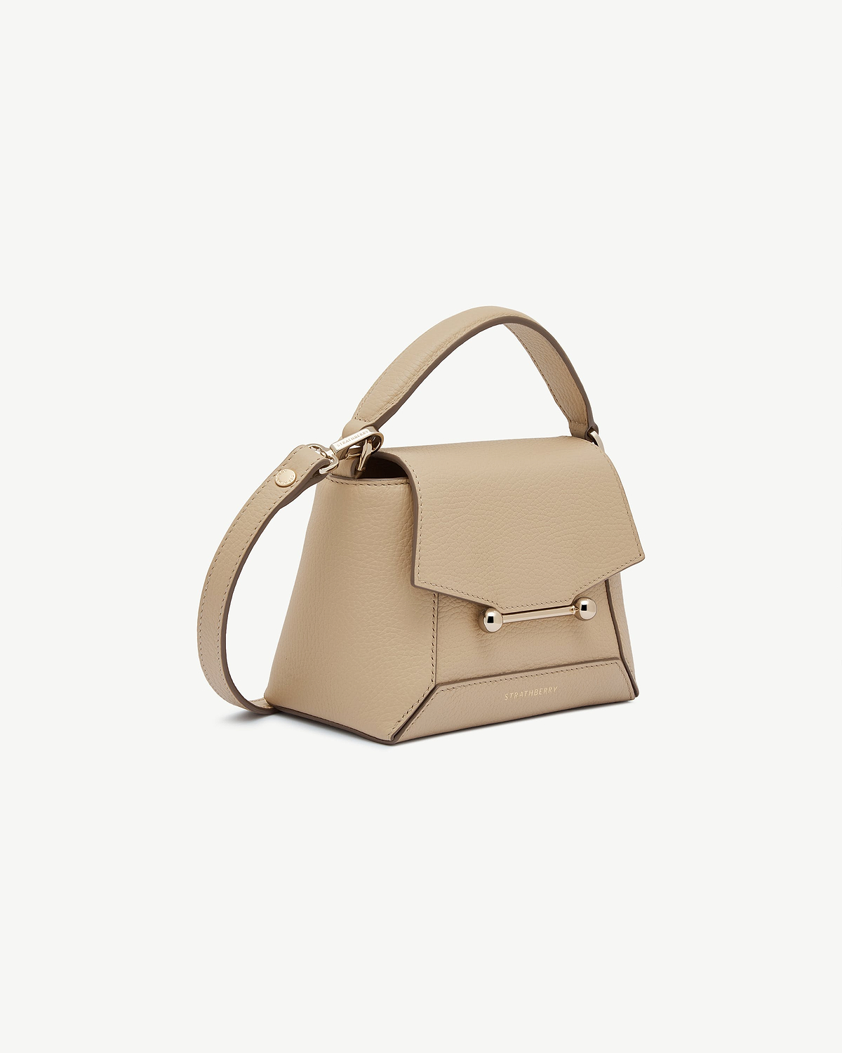 Sand Strathberry Mosaic Nano bag with top handle and gold bar detail.