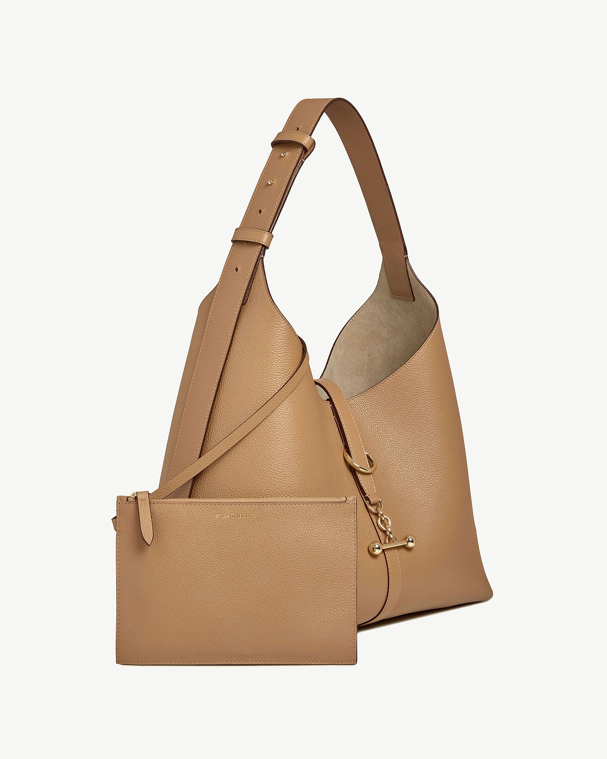 Caramel leather hobo bag with adjustable strap, pouch and gold hardware.