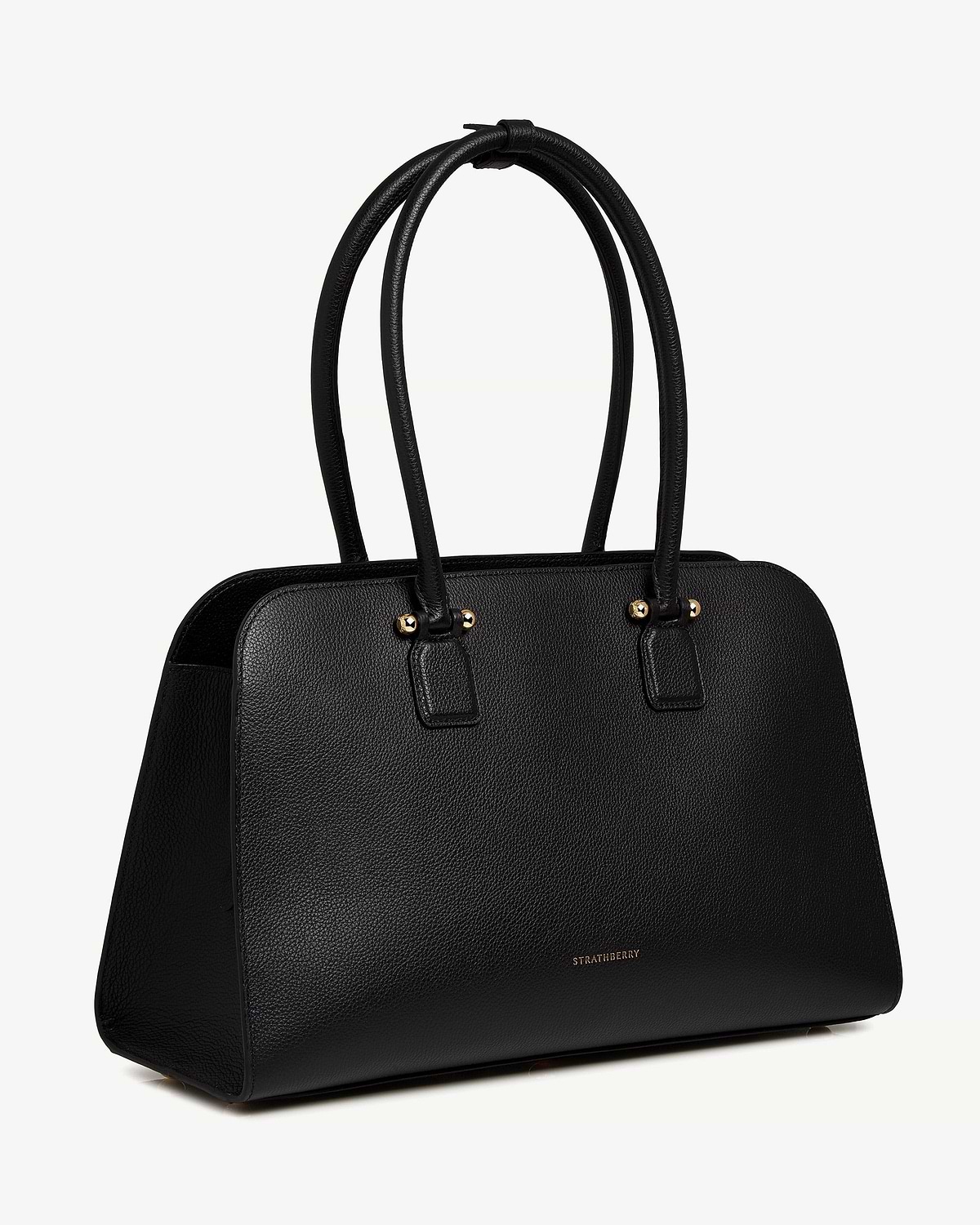 Black pebbled leather Strathberry tote bag with double top handles and gold hardware.