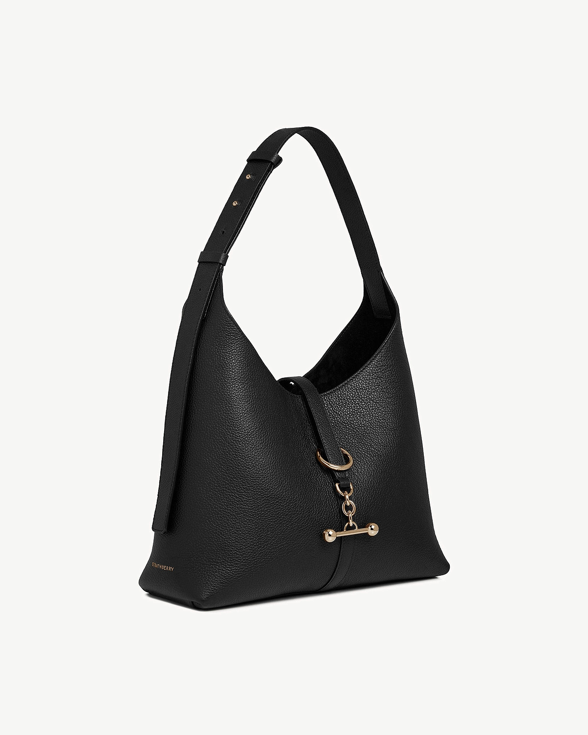 Black pebbled leather Kite Hobo bag by Strathberry with adjustable strap and gold hardware.