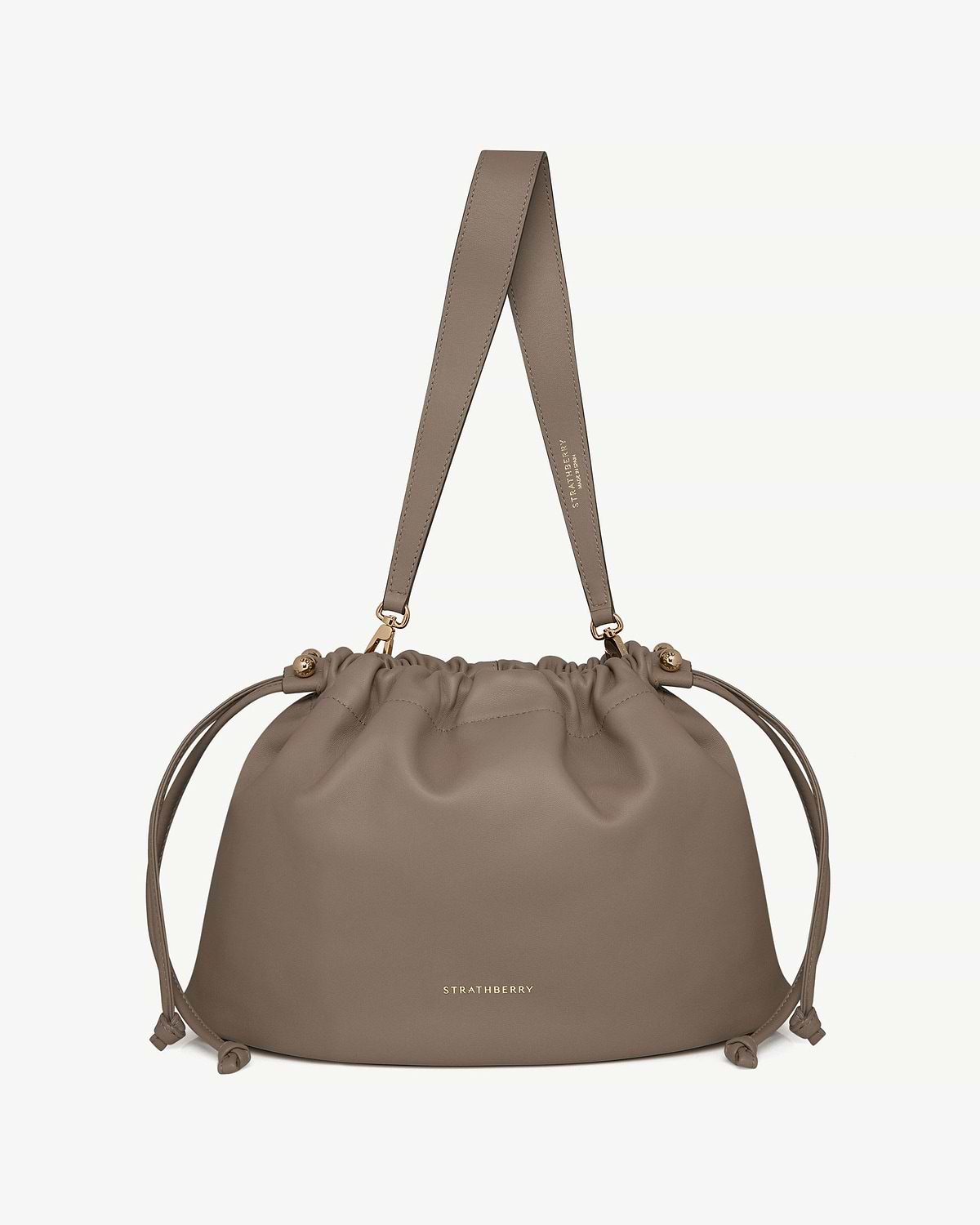 Strathberry Charlotte Midi drawstring bag in taupe with gold hardware and wide strap