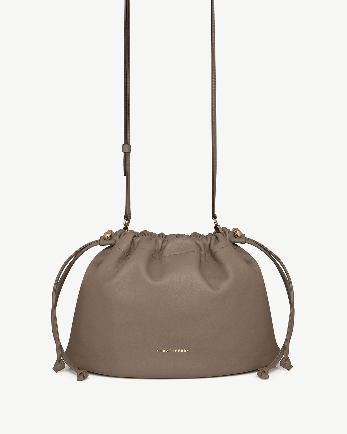 Strathberry Charlotte Midi drawstring bag in taupe leather with adjustable strap