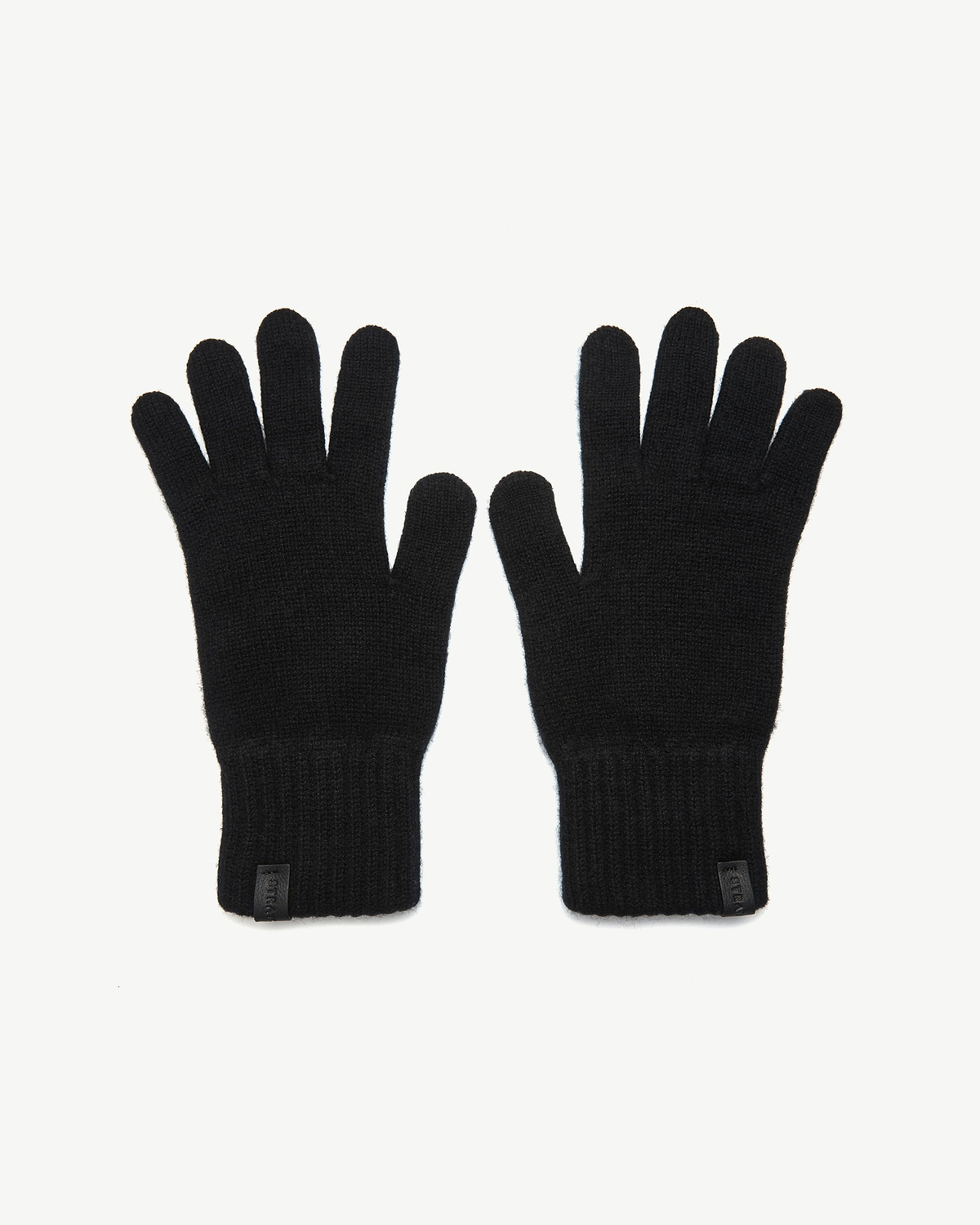Pair of black knitted gloves with ribbed cuffs laid flat on white background.