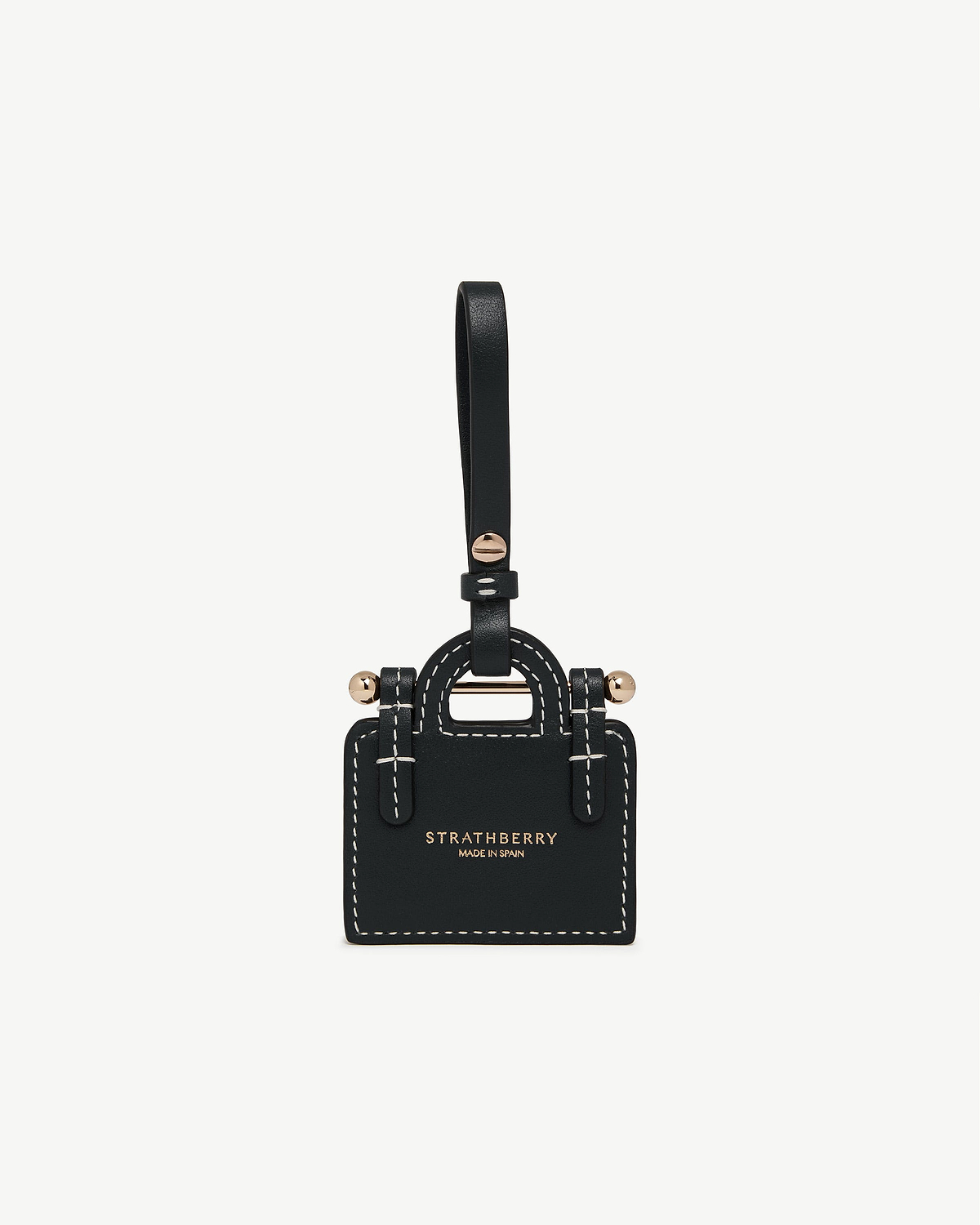 Black leather tote charm with strap, gold hardware and STRATHBERRY logo