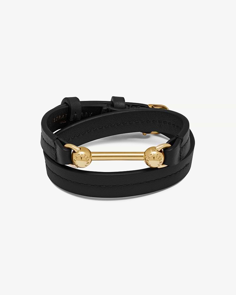 Black double-wrap leather bracelet with gold Strathberry bar hardware and buckle