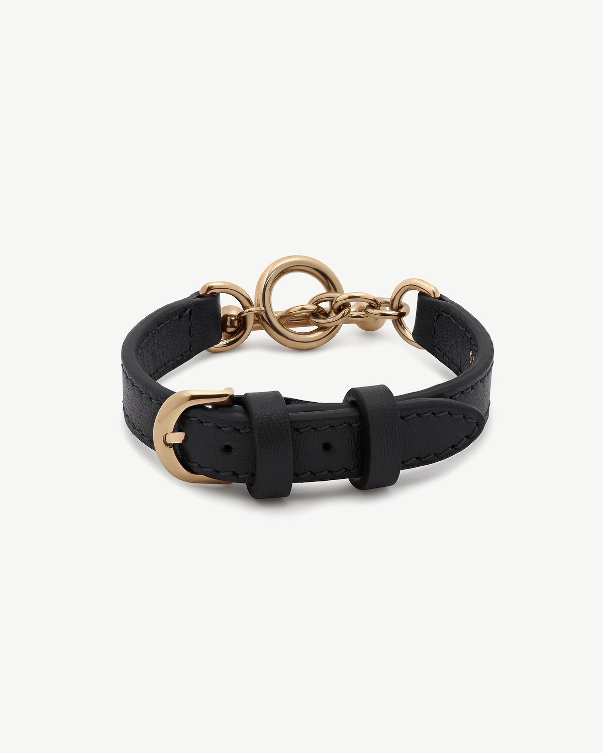 Black leather bracelet with gold-tone circular toggle and buckle clasp.