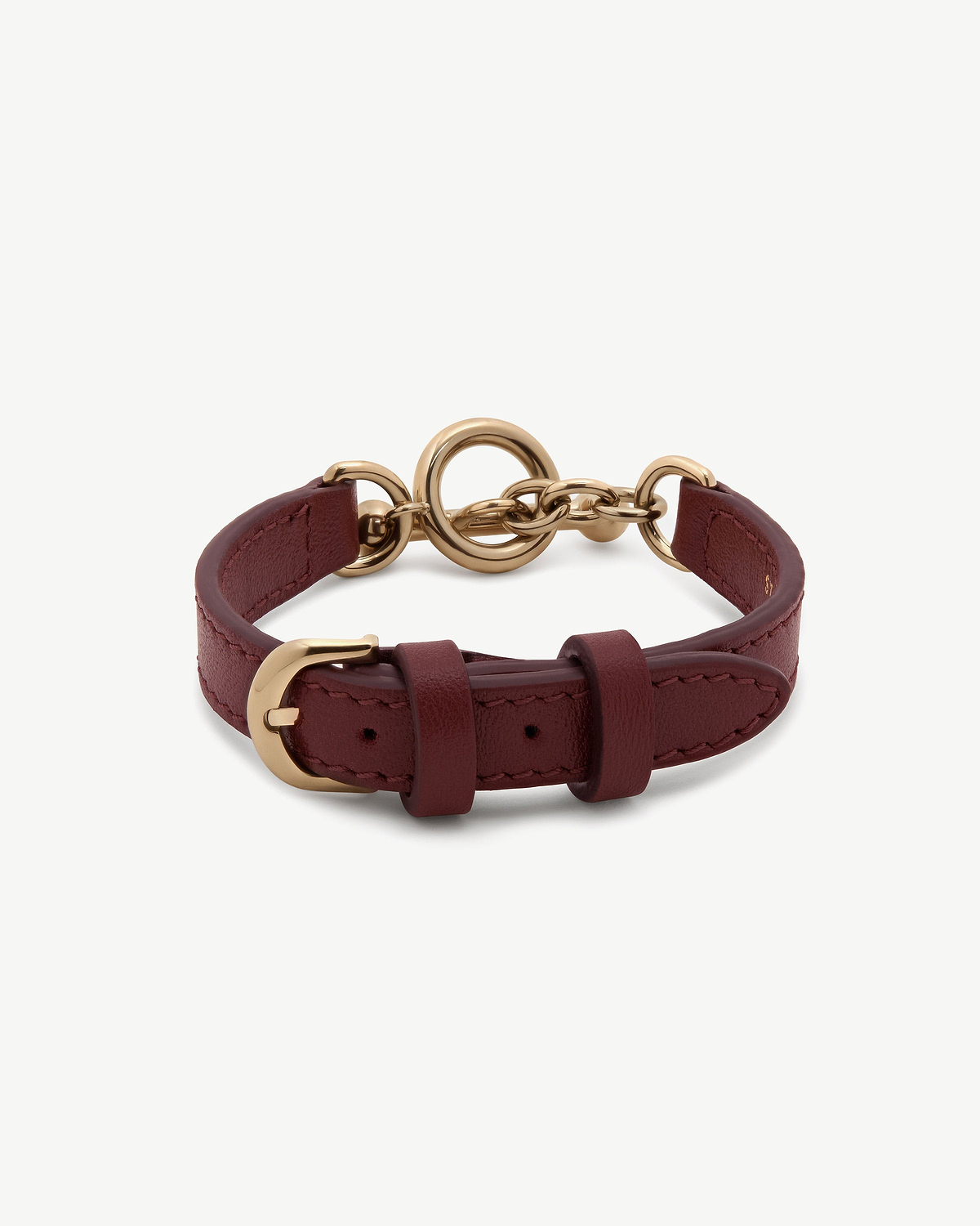 Oxblood leather kite bracelet with gold-tone buckle and chain clasp.