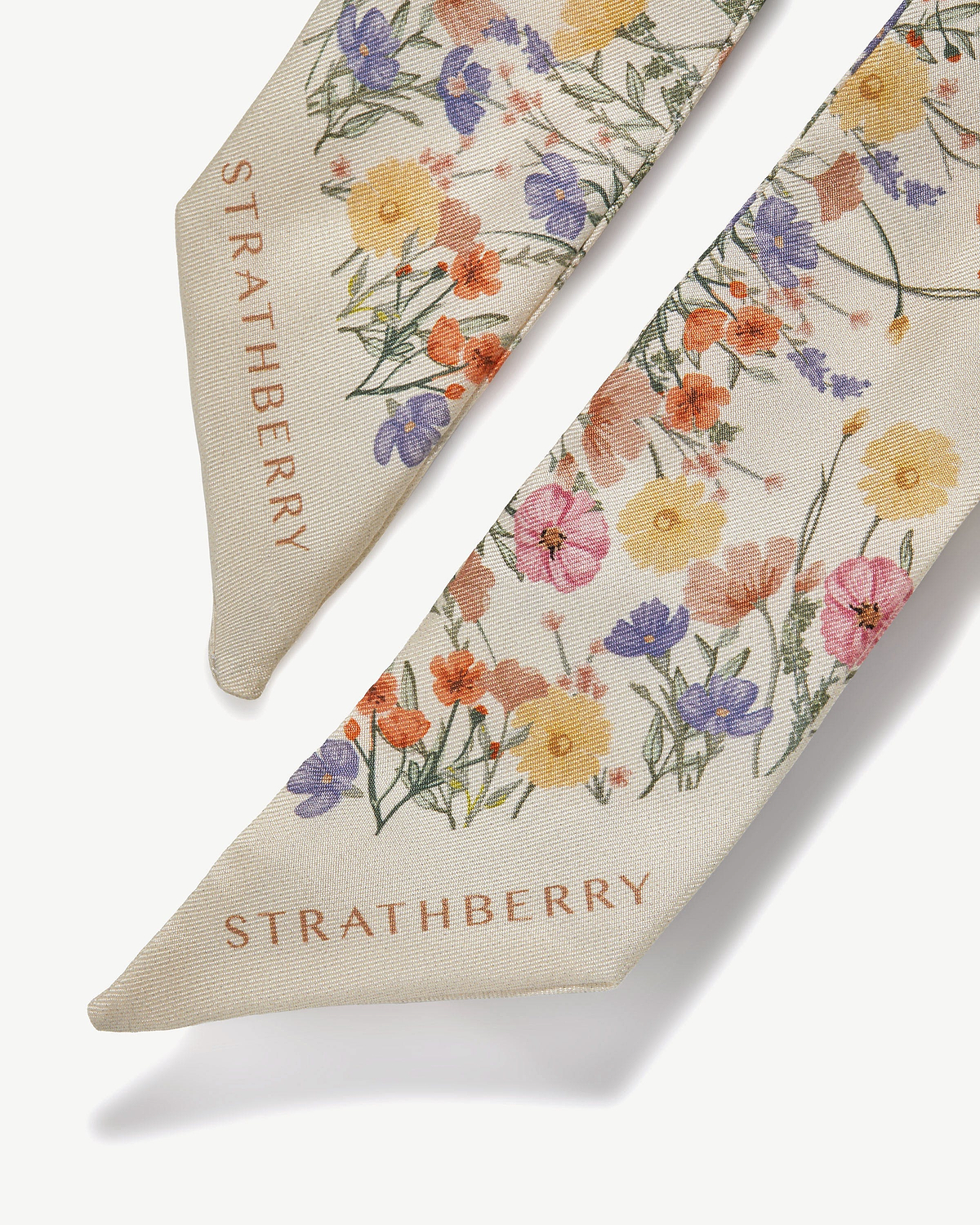 Vanilla silk skinny scarf with multicolour floral print and Strathberry logo.
