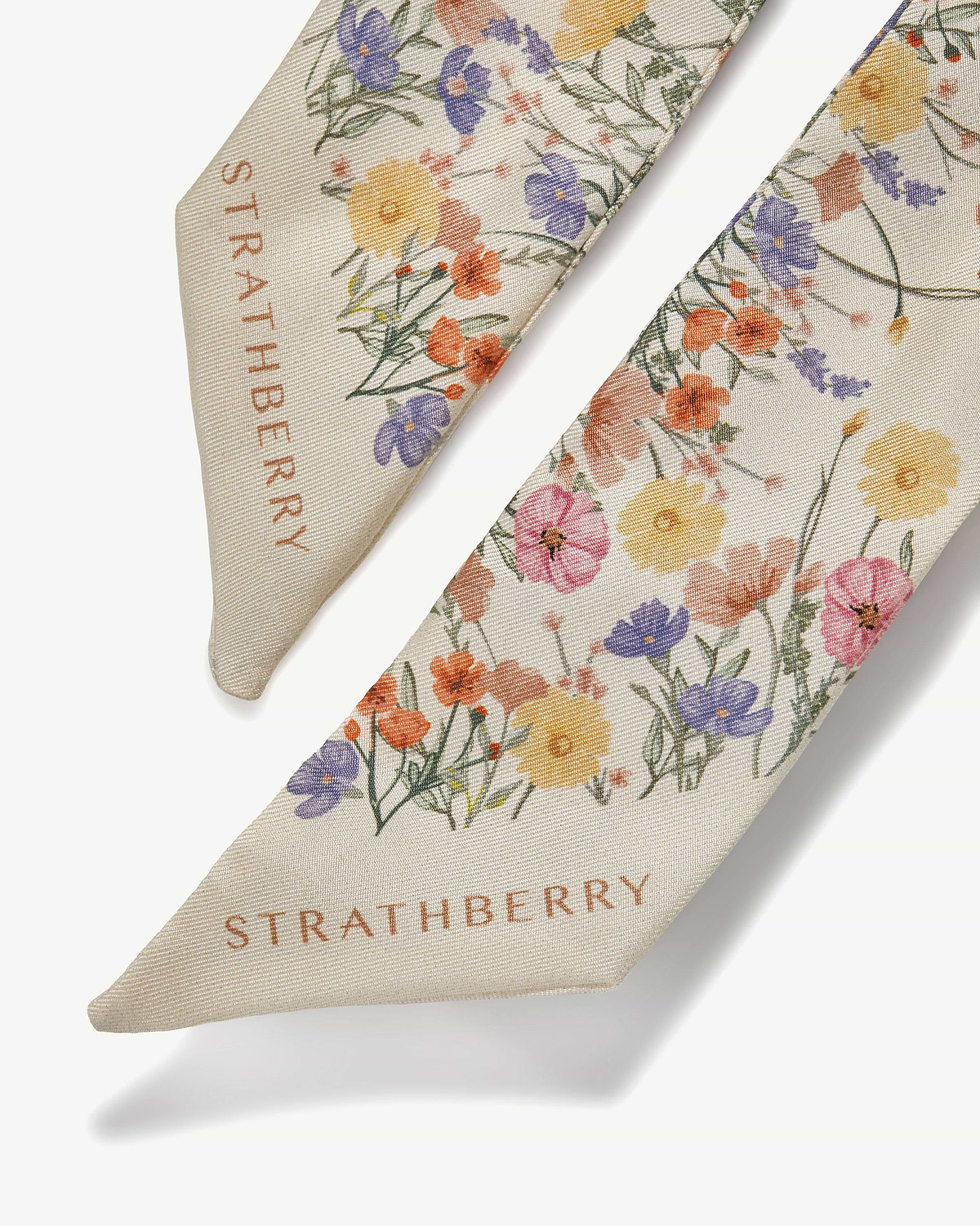 Vanilla silk skinny scarf with multicolour floral print and Strathberry logo.