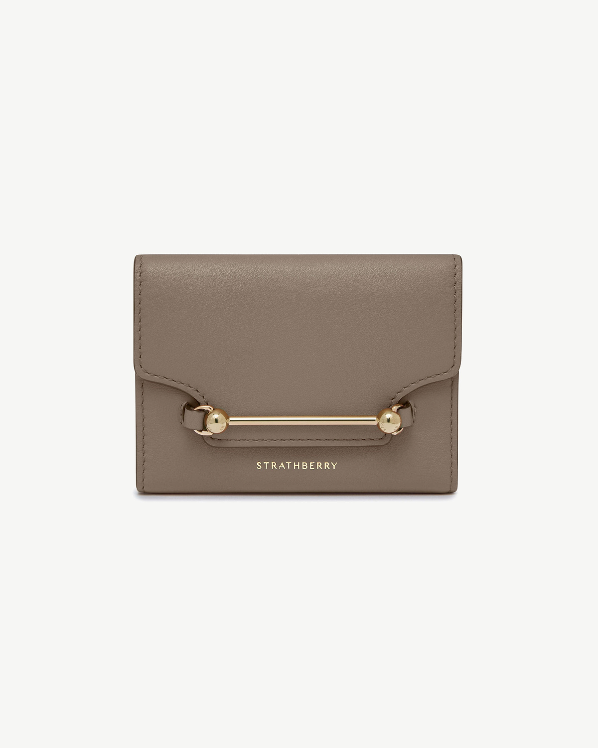 Taupe Strathberry Multrees trifold wallet with gold bar hardware and logo.