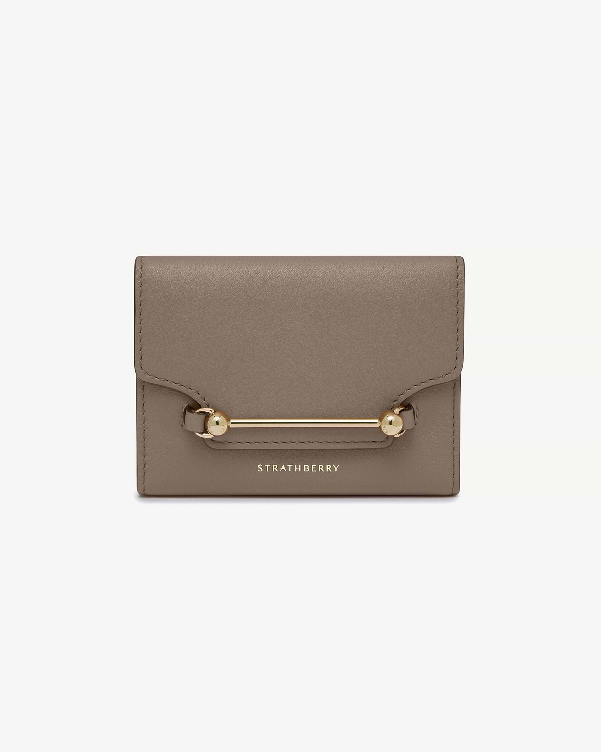 Taupe Strathberry Multrees trifold wallet with gold bar hardware and logo.