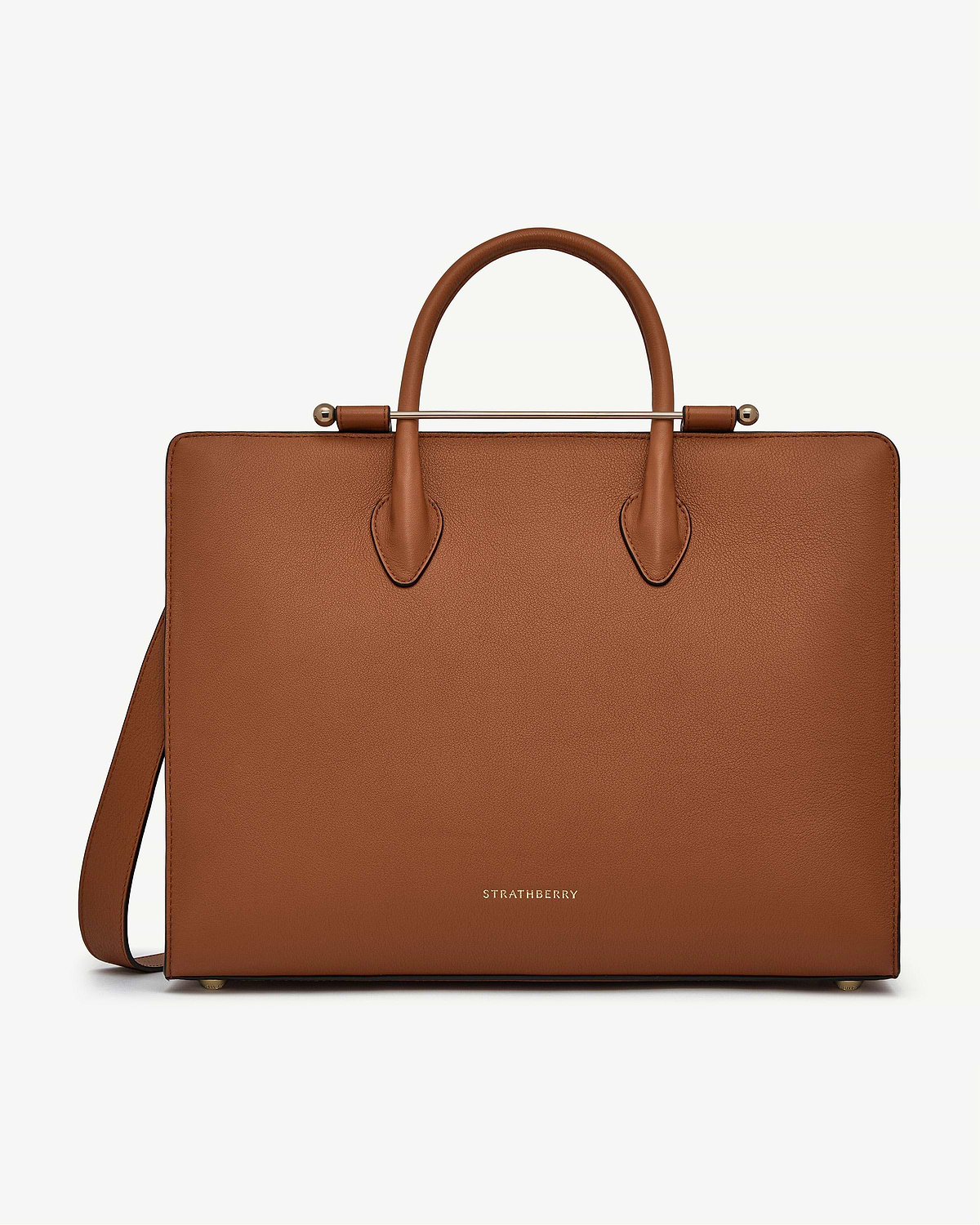 Chestnut leather tote bag with top handles, gold metal bar, Strathberry logo.