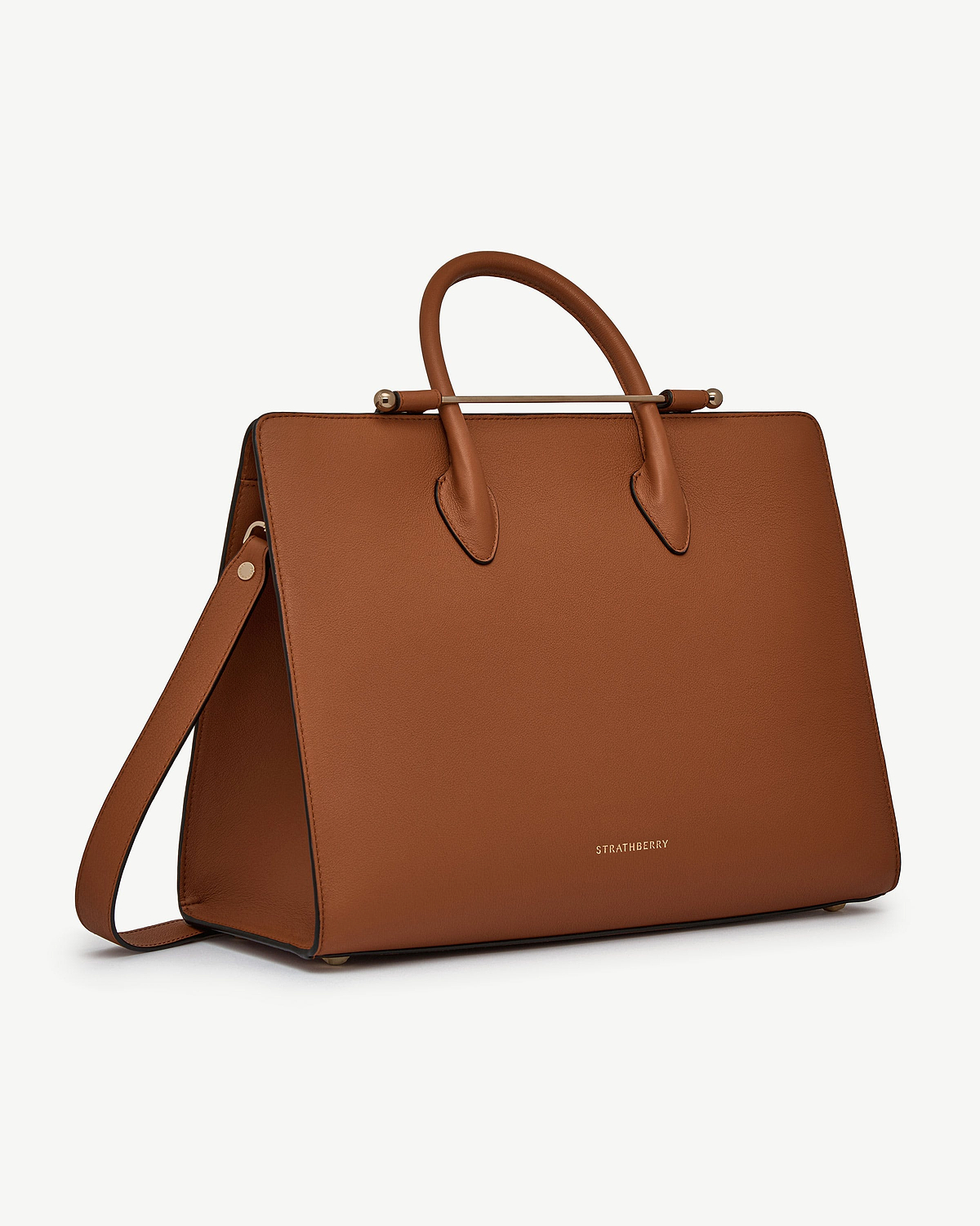 Chestnut leather Strathberry tote with top handles and shoulder strap