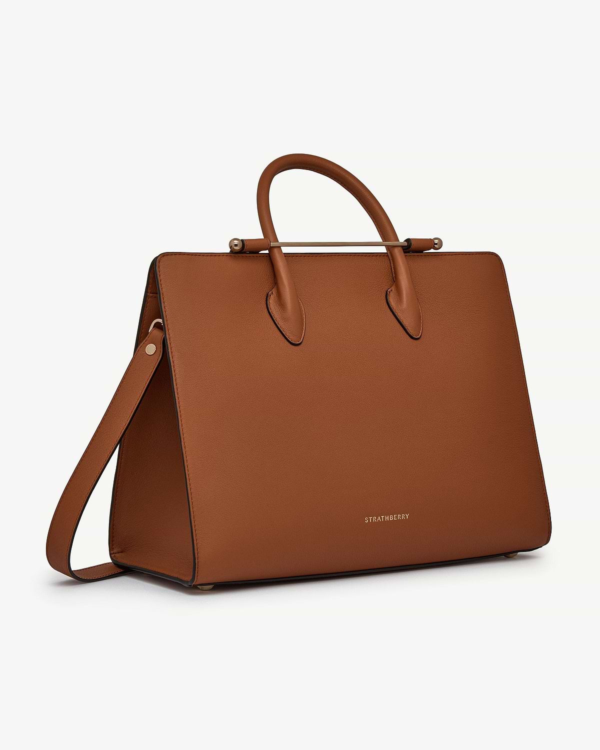 Chestnut leather Strathberry tote with top handles and shoulder strap