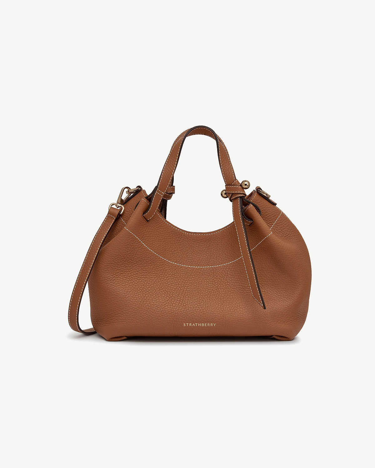 Tan Strathberry Barra Mini leather bag with top handles and shoulder strap.