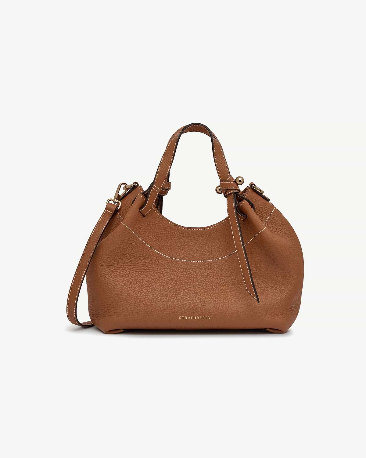 Tan Strathberry Barra Mini leather bag with top handles and shoulder strap.