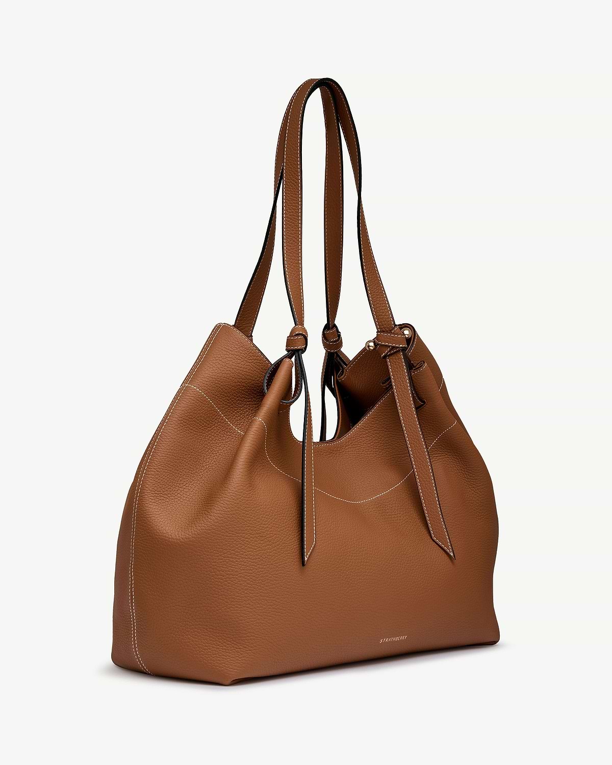 Tan pebbled leather Barra tote with knotted handles, white contrast stitching, Strathberry logo