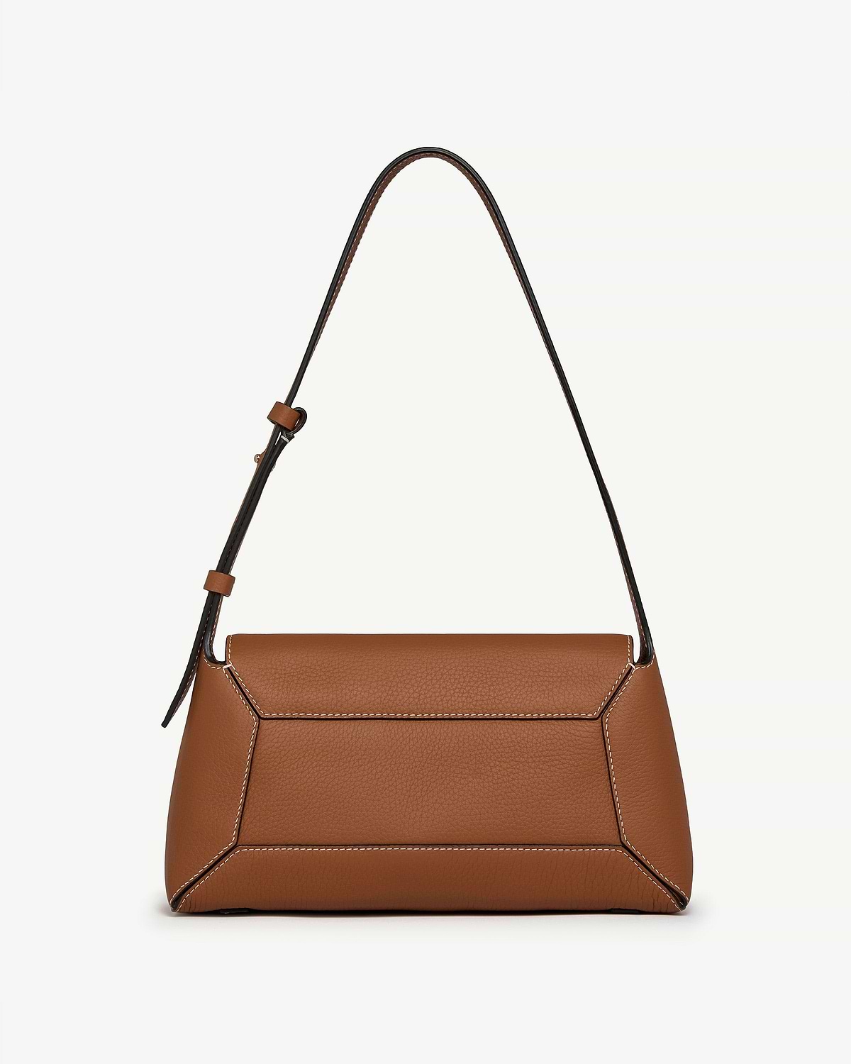 Tan shoulder bag with adjustable strap, flap top and white topstitching.