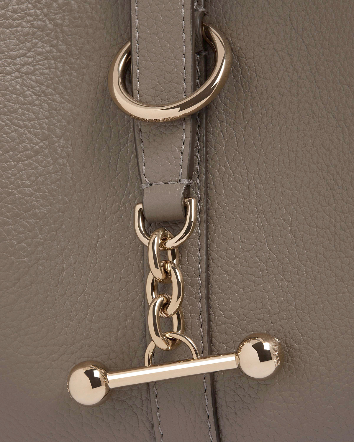 Taupe pebbled leather with gold chain and Strathberry engraved toggle
