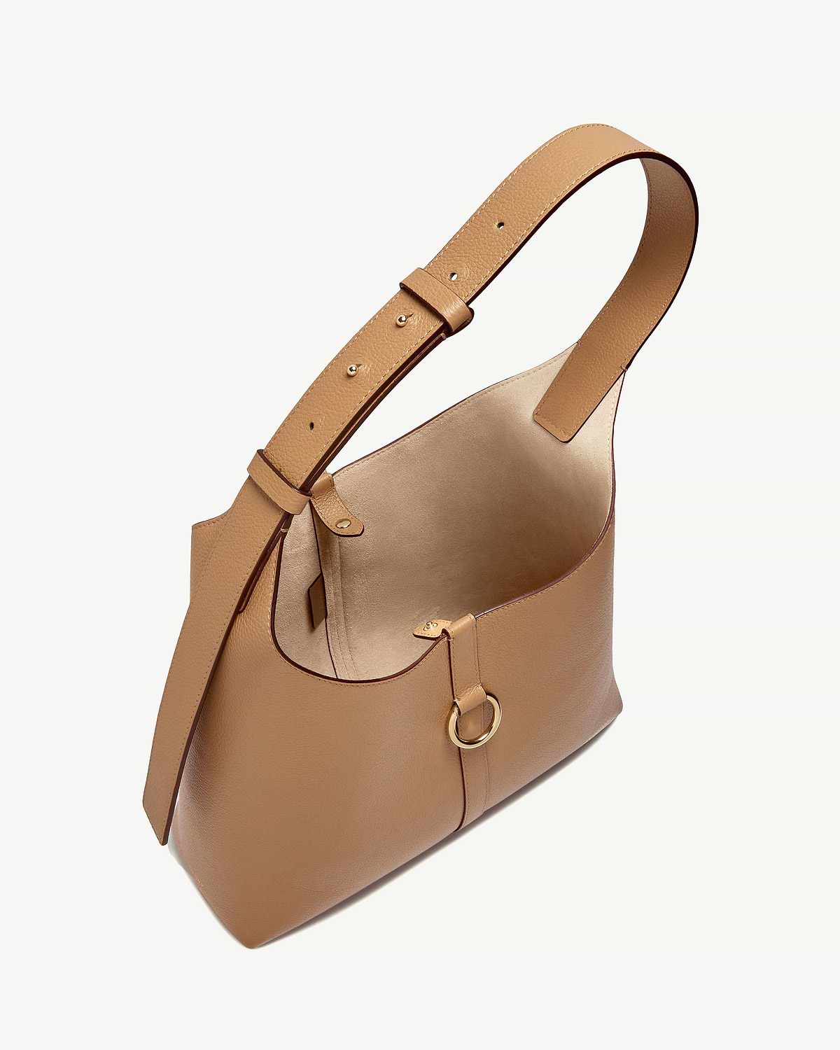 Caramel leather kite hobo bag with adjustable shoulder strap and gold ring detail