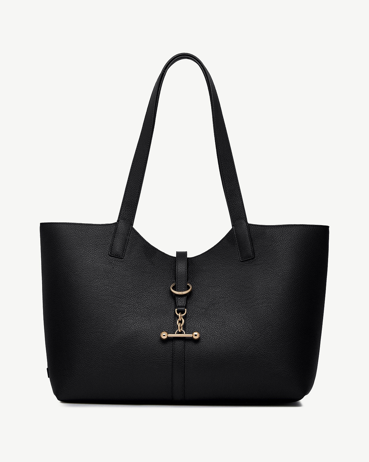 Black pebbled leather tote bag with gold bar and D-ring front hardware.