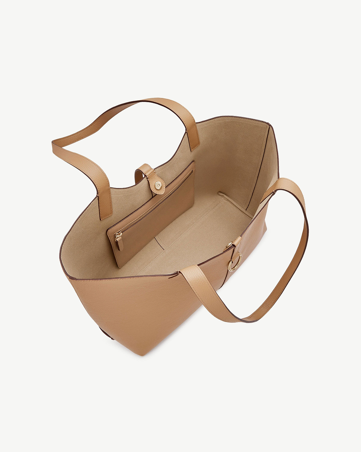 Caramel leather kite tote bag open to show interior and zipped pocket.