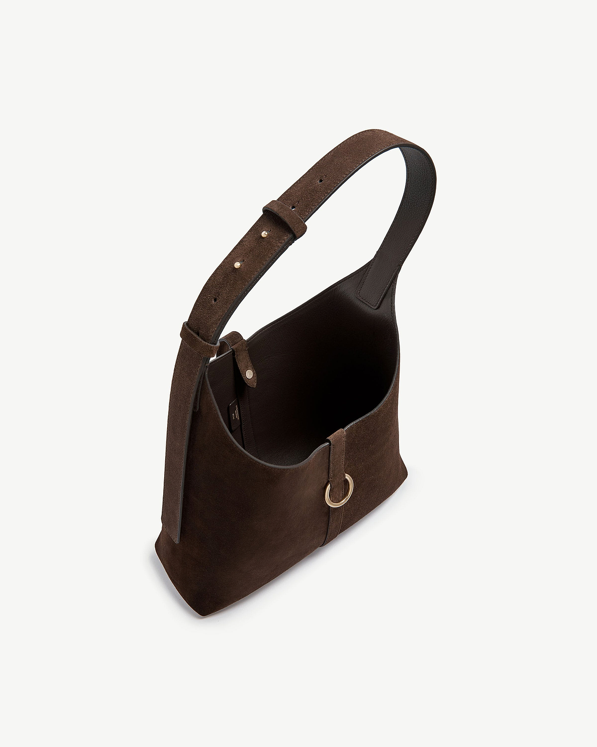 Chocolate suede hobo bag with adjustable strap, gold ring detail and open interior.