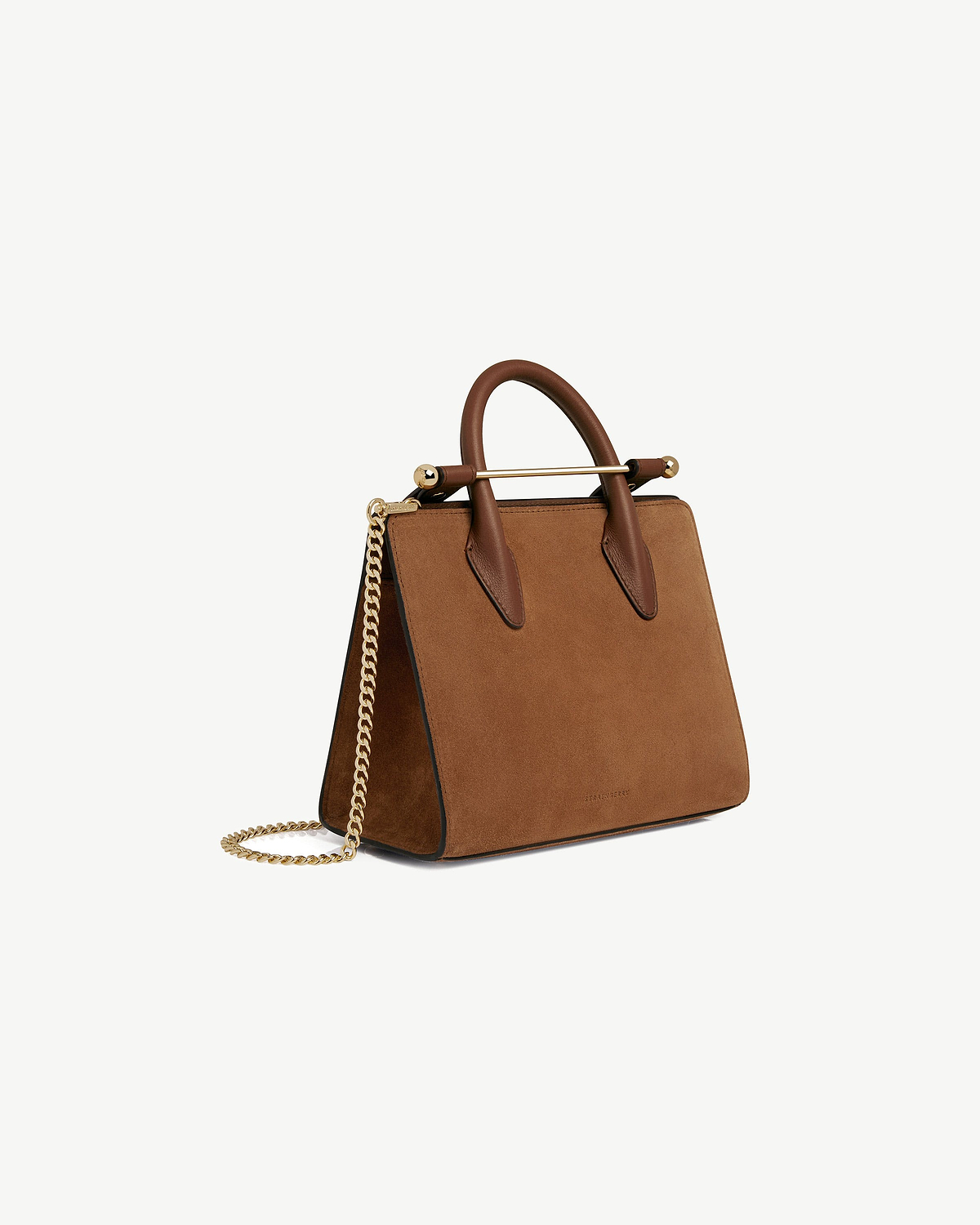 Strathberry tan suede mini tote with top handles and gold chain strap.