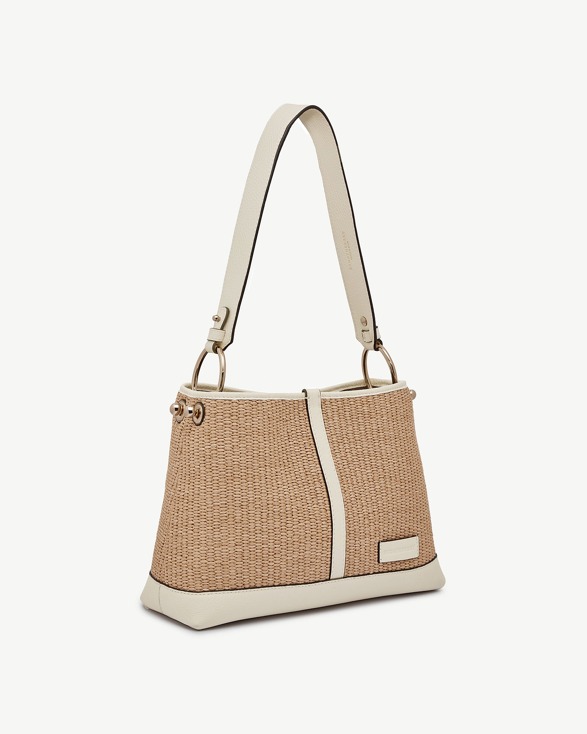 Vanilla and natural raffia Lana hobo bag with cream leather trim and gold ring hardware.