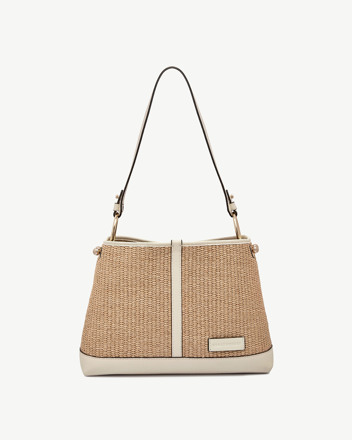 Vanilla raffia Lana Hobo bag with leather trim and Strathberry logo.