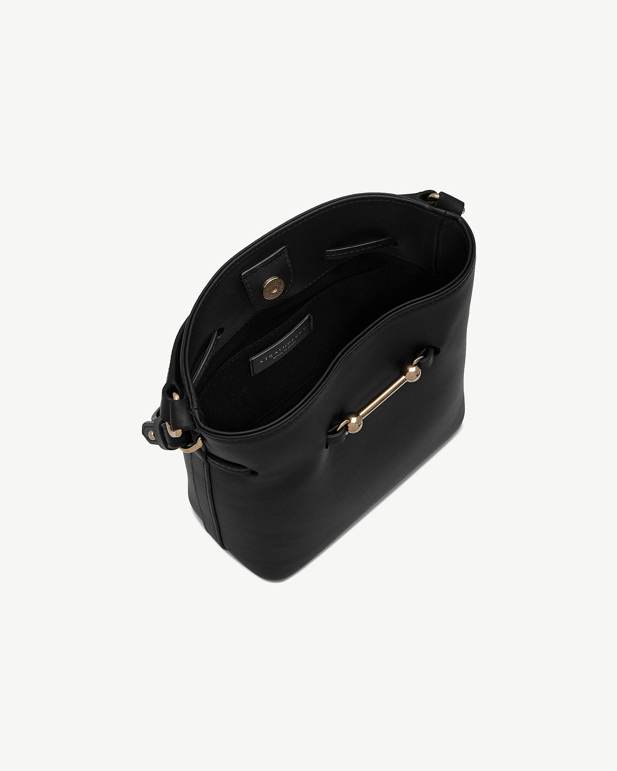 Black Strathberry Corda Bucket Mini bag, open top showing interior and gold-coloured hardware.